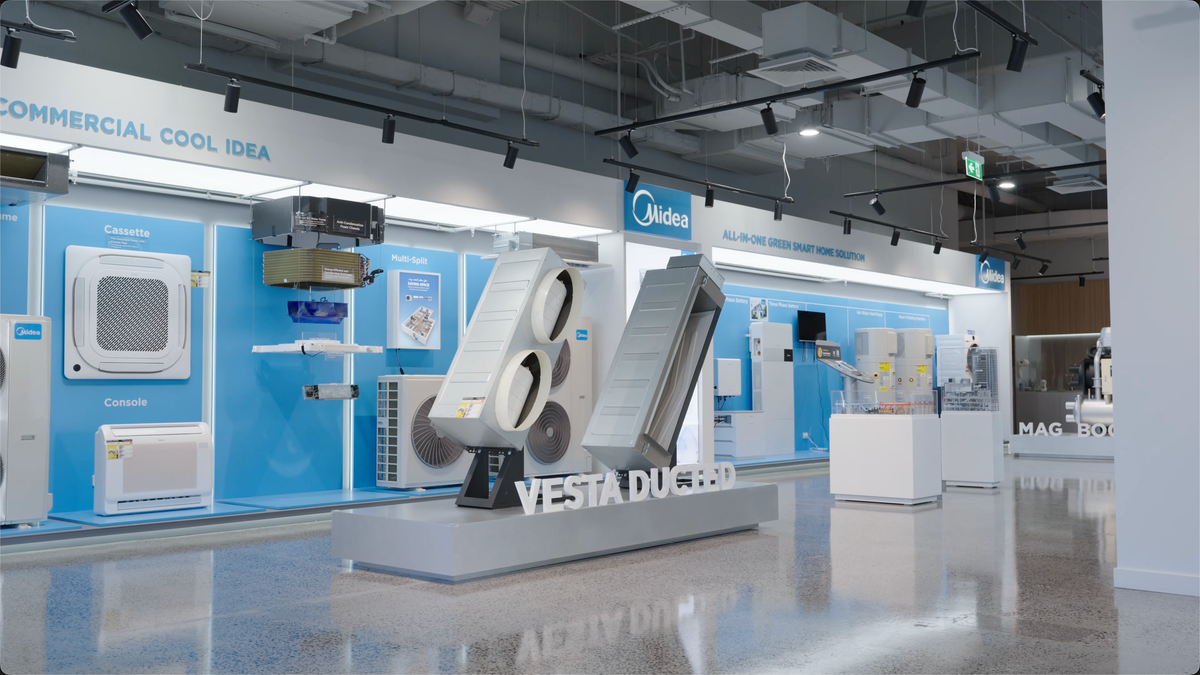 Midea showroom after dark with the display lighting on