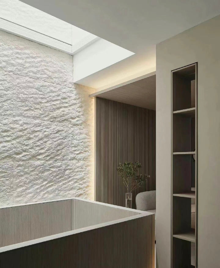 Soft Stone RockEdge architectural wall panels used in interior spaces, featuring bold stone texture and natural layered surface