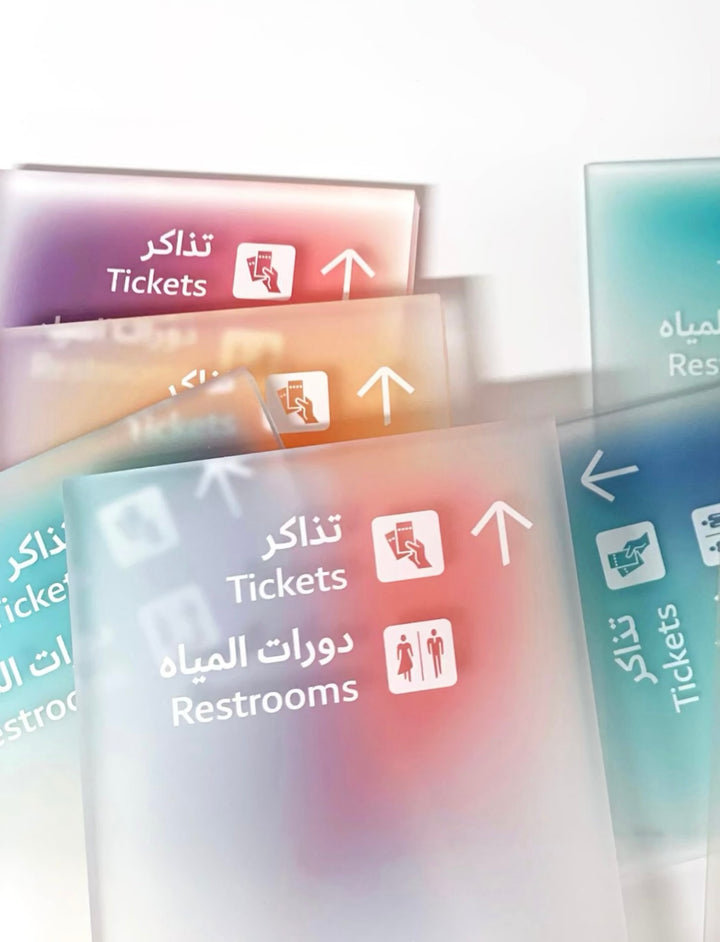 Acrylic gradient wayfinding sign system with illuminated panels for retail, hospitality and public spaces