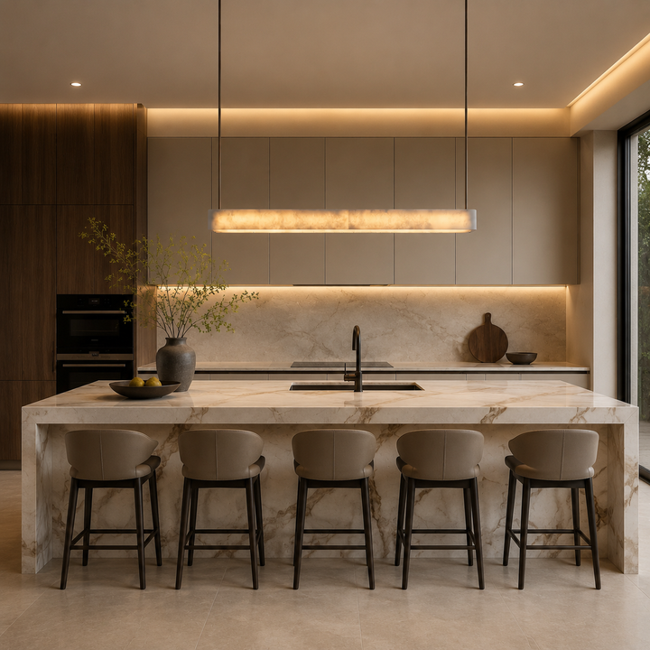 Luxury alabaster linear pendant light above a kitchen island, handcrafted natural stone LED pendant lighting for modern kitchens, dining spaces and contemporary luxury interiors.