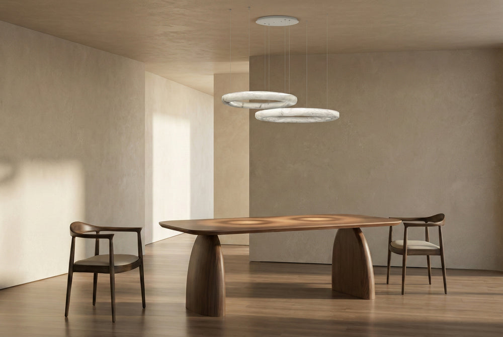 Alabaster ring pendant light suspended above wooden dining table in contemporary home – Aurelia