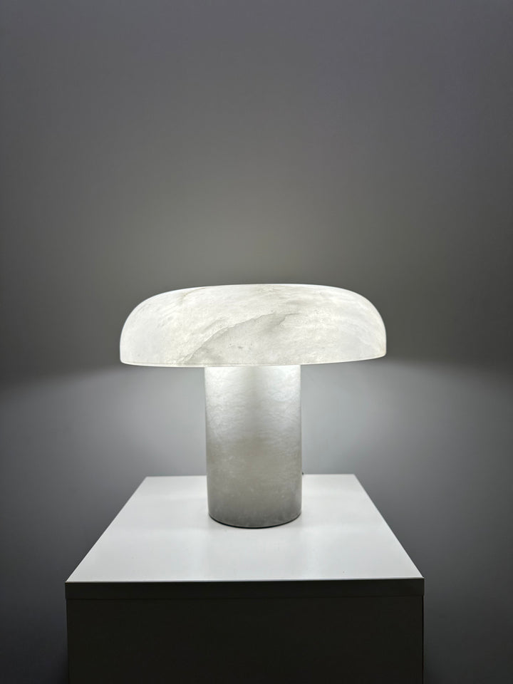 Sculptural alabaster stone table lamp with minimalist modern form, ideal for living rooms, consoles and bedside lighting.