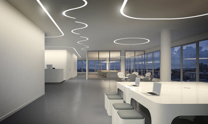 Architectural curved LED linear lighting installation using FlexTrim CXT80 in modern commercial interior ceiling design