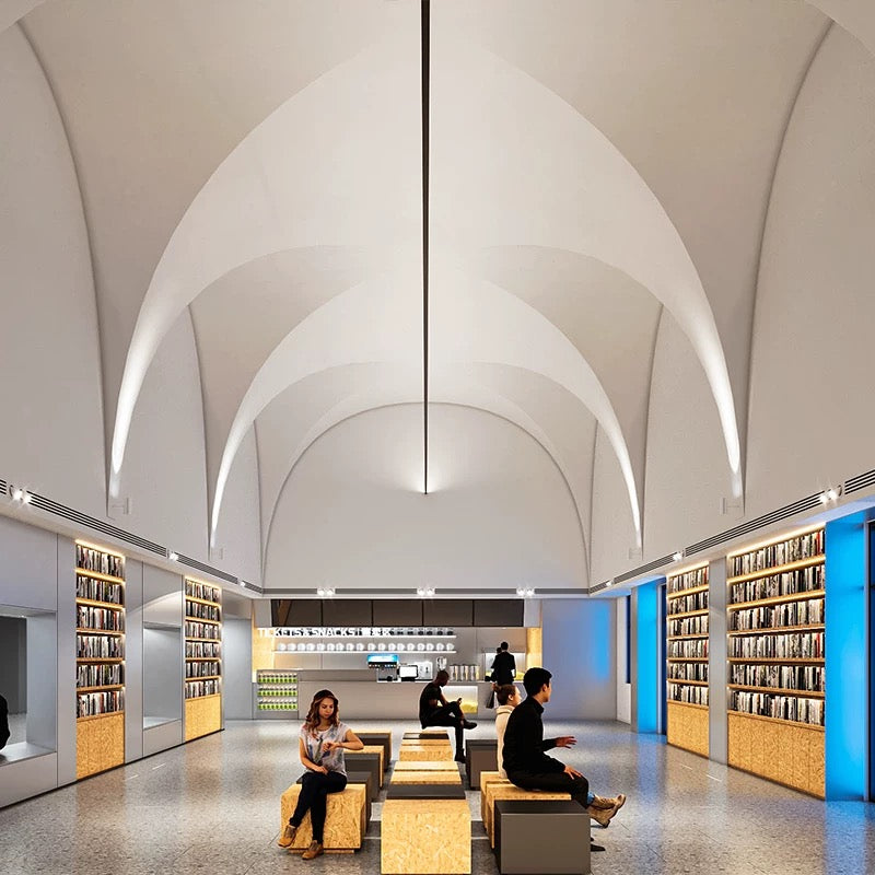 architectural linear LED ceiling light enhancing a white vaulted gallery space with clean continuous illumination