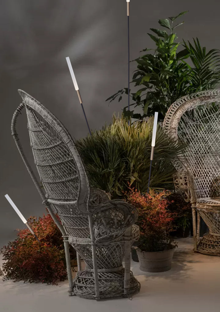 Artistic outdoor landscape installation using reed spike lights for visual accent lighting