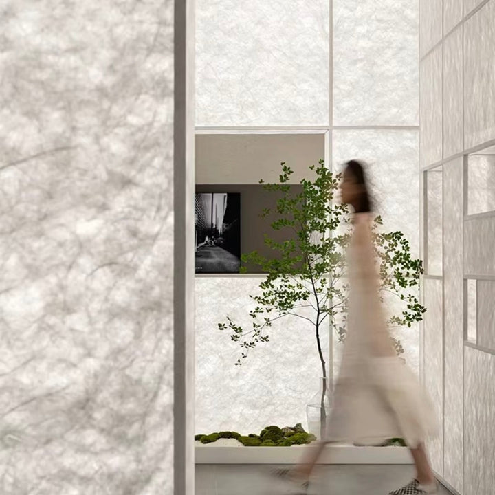 Backlit panel lighting system creating soft diffused light for architectural interior walls