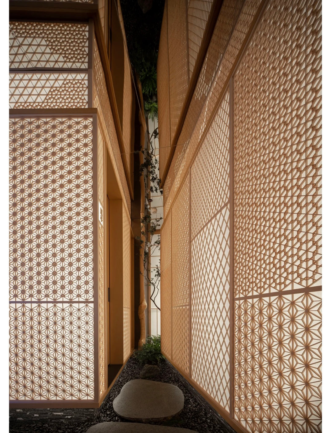 Bamboo weave resin board used as decorative wall panels in a narrow corridor interior with textured surface