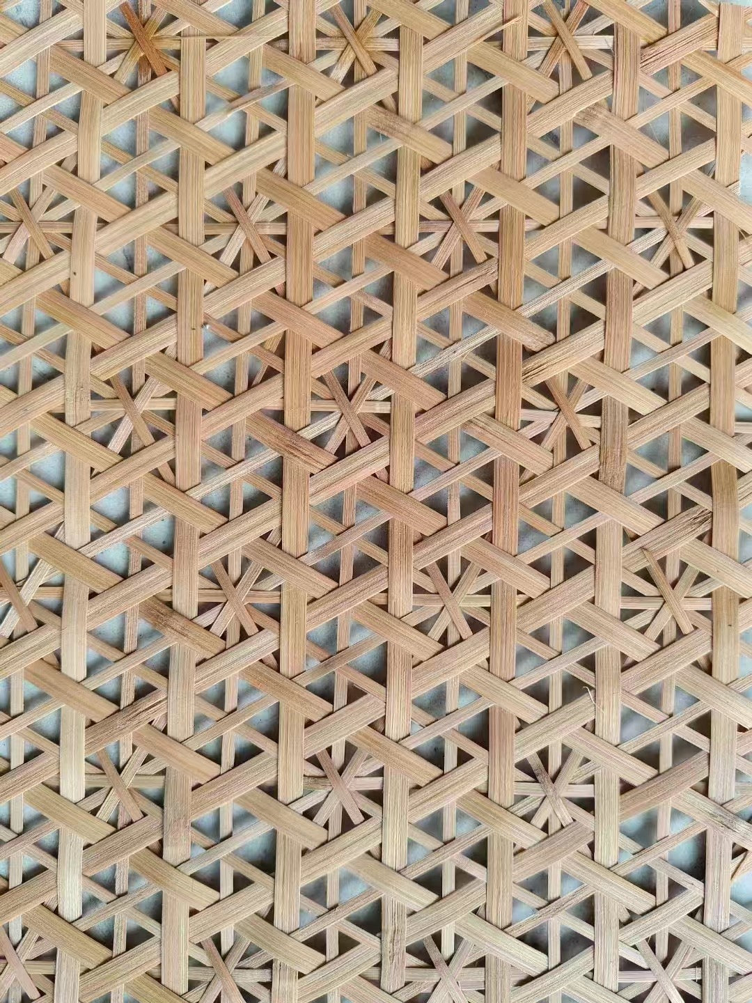 Bamboo weave resin board with geometric patterned surface used as decorative wall panels for interior design
