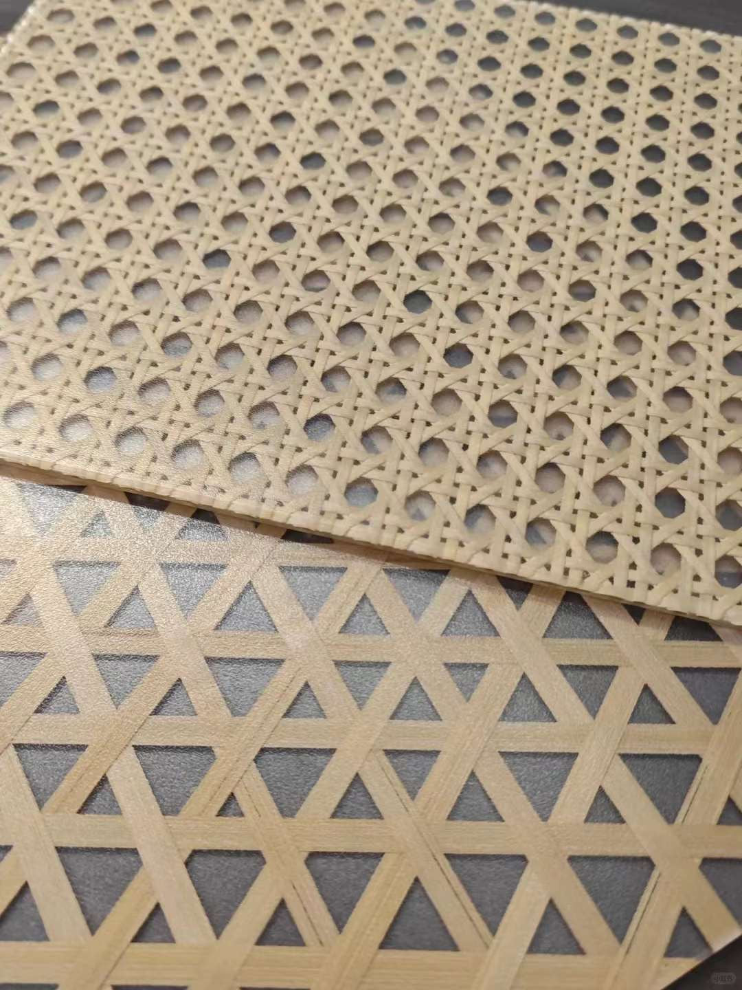 Layered bamboo weave resin board panels showing structural detail and patterned surface for decorative wall applications