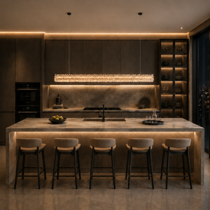 Belo Glacia double layer crystal linear pendant light suspended above a luxury kitchen island, featuring handcrafted South American crystal, integrated LED lighting and contemporary architectural design.