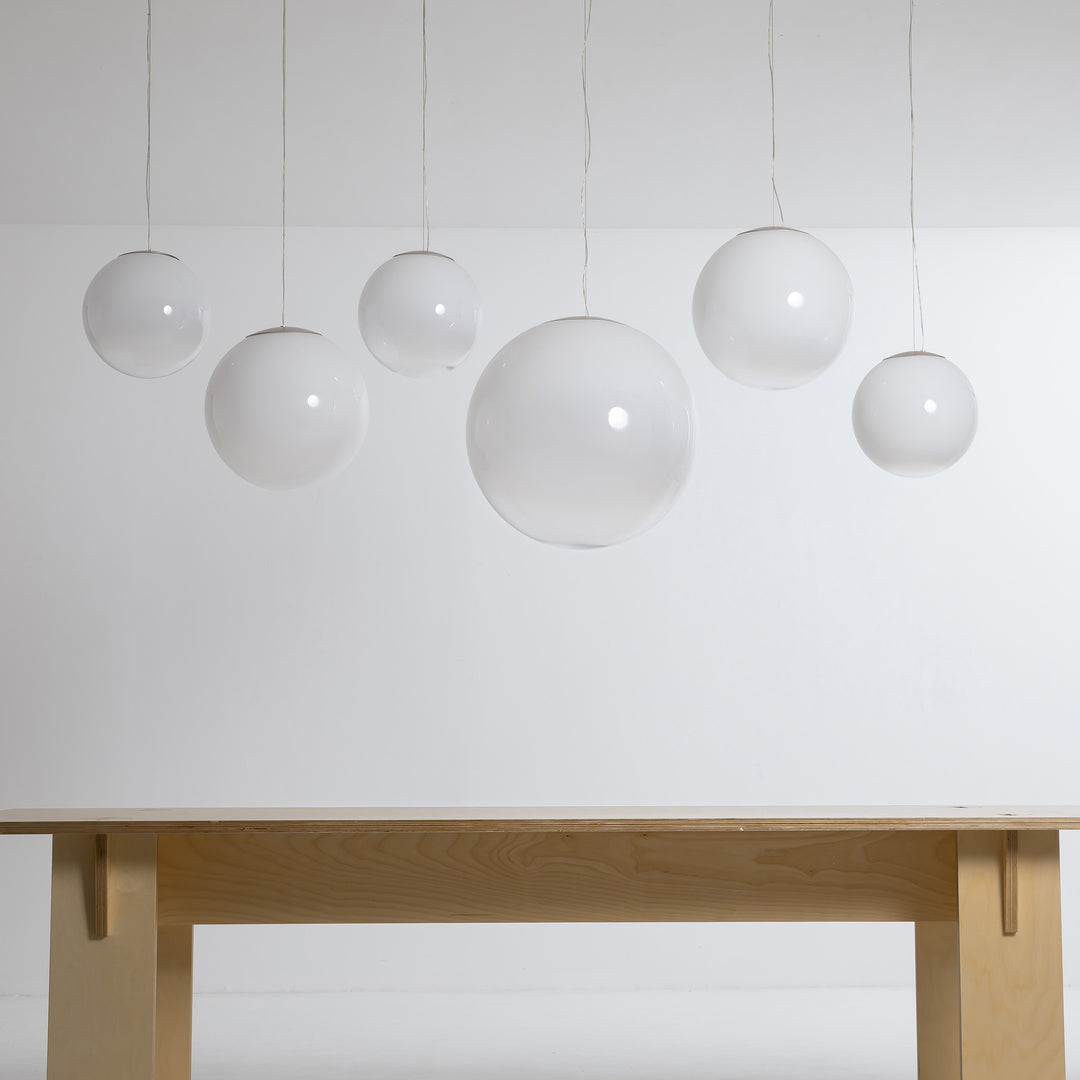 Clear gradient glass pendant light cluster with soft frosted finish