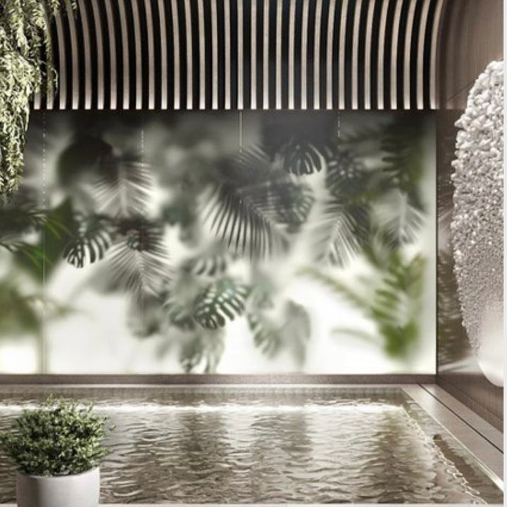 Cloud Silk Board textured decorative wall panel used as a feature wall with soft plant shadows in a modern interior