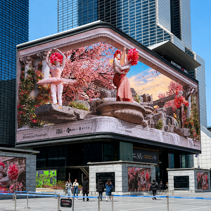 Corner outdoor LED billboard installed on a commercial building displaying high-resolution advertising content
