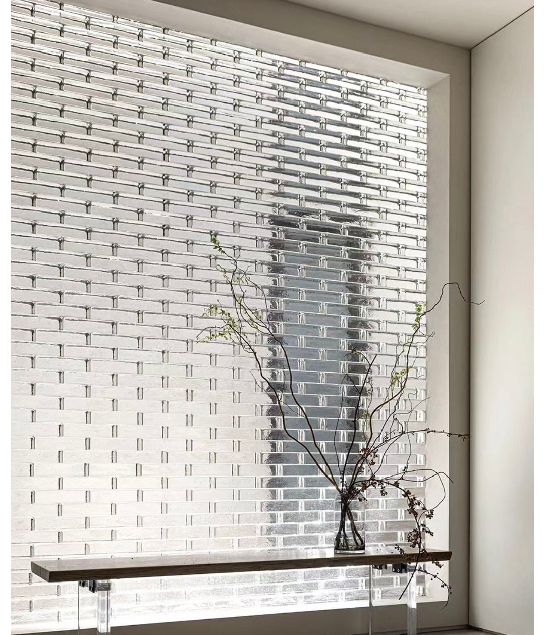 Crystal brick glass block wall allowing light transmission in interior space