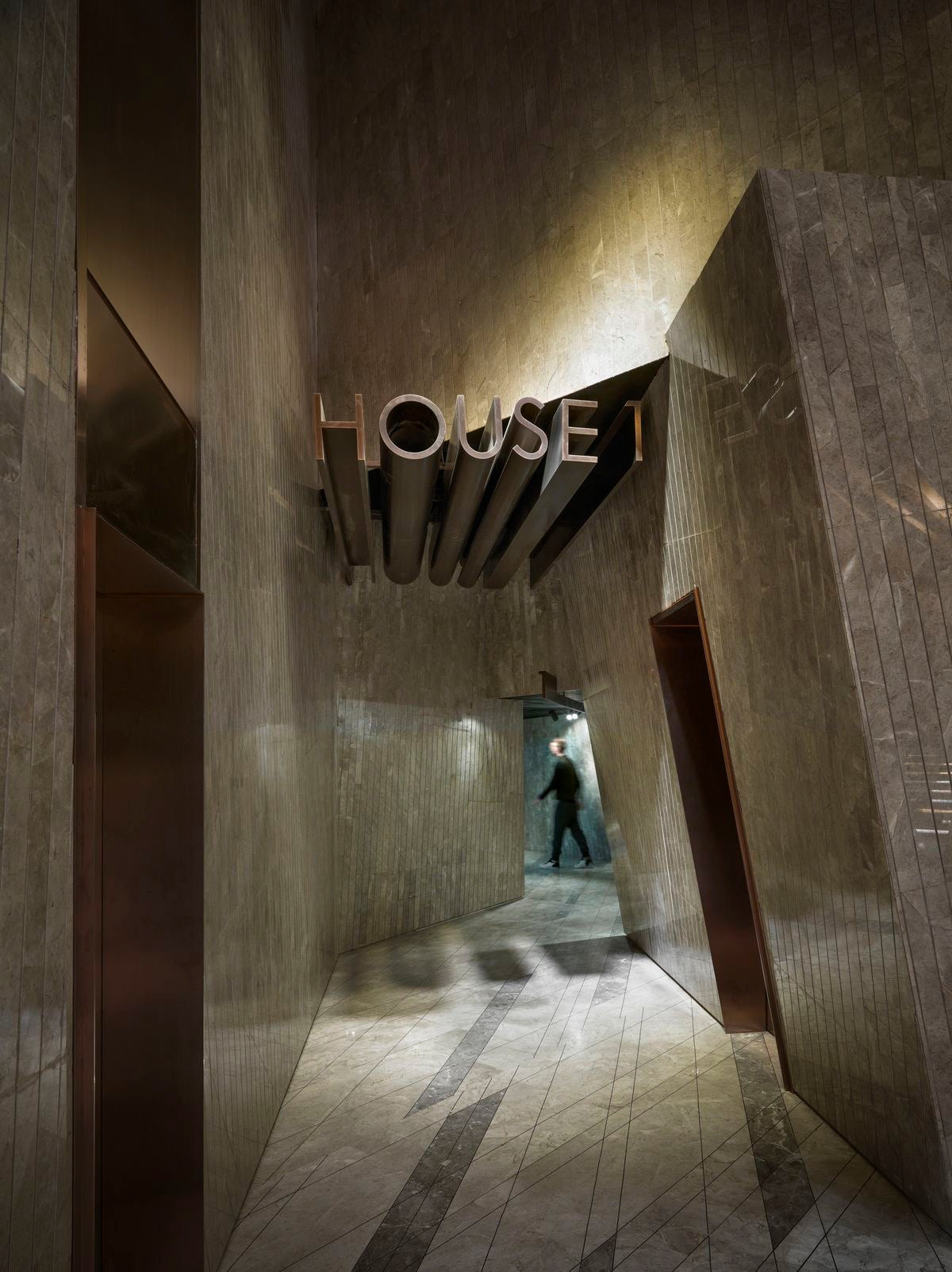 Custom 3D structural letter signage for hotel lobby and hospitality entrance