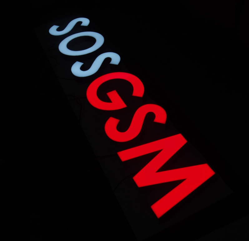 Custom front lit LED channel letter sign with red illuminated letters for business signage and branding