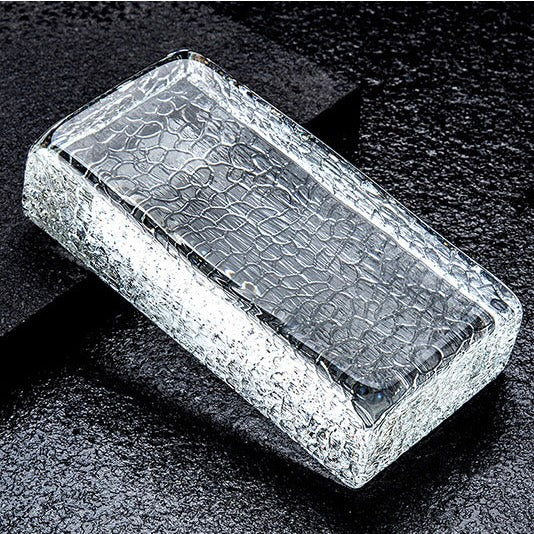 Decorative crystal glass brick featuring rugged textured surface for feature walls