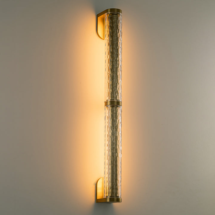 Double wall light with crystal glass creating warm feature wall lighting