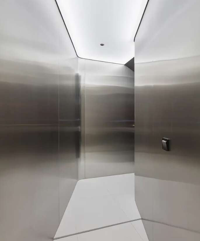 EcoChar decorative ceiling panels integrated into a modern interior with linear lighting.