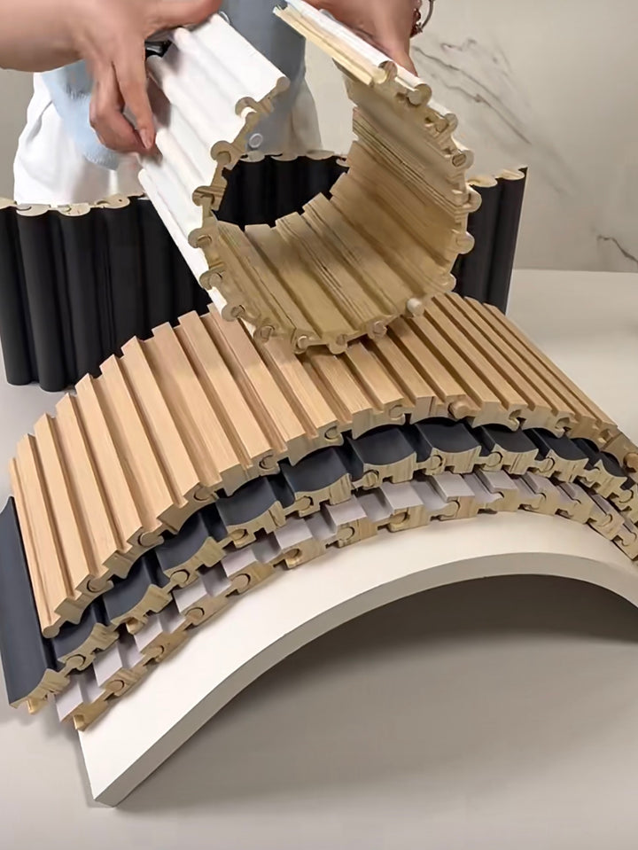 Flexible EcoSpin timber louver panels demonstrating bending capability for curved wall applications