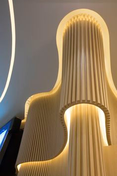 Painted EcoSpin timber louver wall panels used in a modern office interior for visual zoning