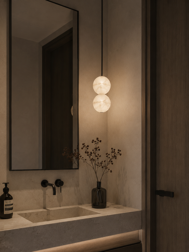 Elara Spanish Alabaster Pendant Light with two natural stone spheres in a modern bathroom