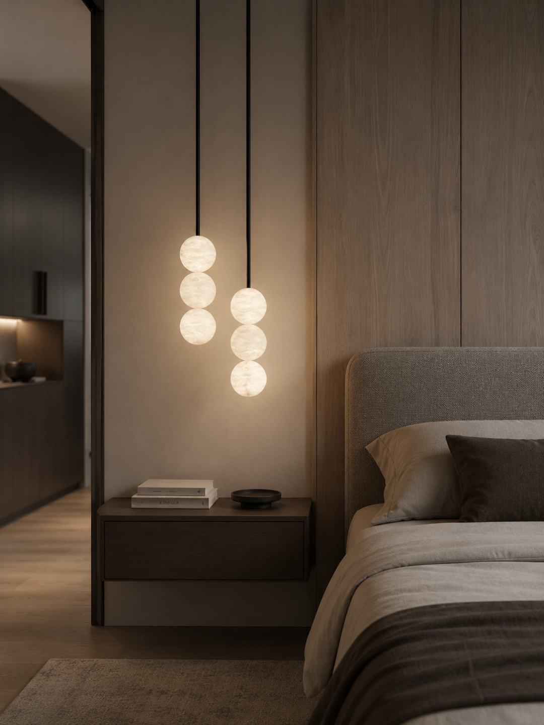 Elara Spanish Alabaster Pendant Light with natural stone spheres beside a modern bedroom