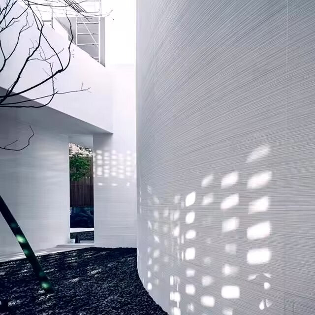 Fine Line Stone textured wall panel creating light and shadow effects