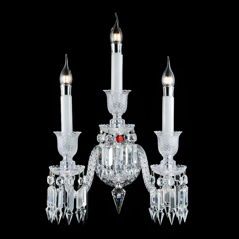 triple crystal classic designer wall lamp shown on black background ideal for elegant indoor wall lighting formal dining rooms hallways bedrooms and luxury home interiors