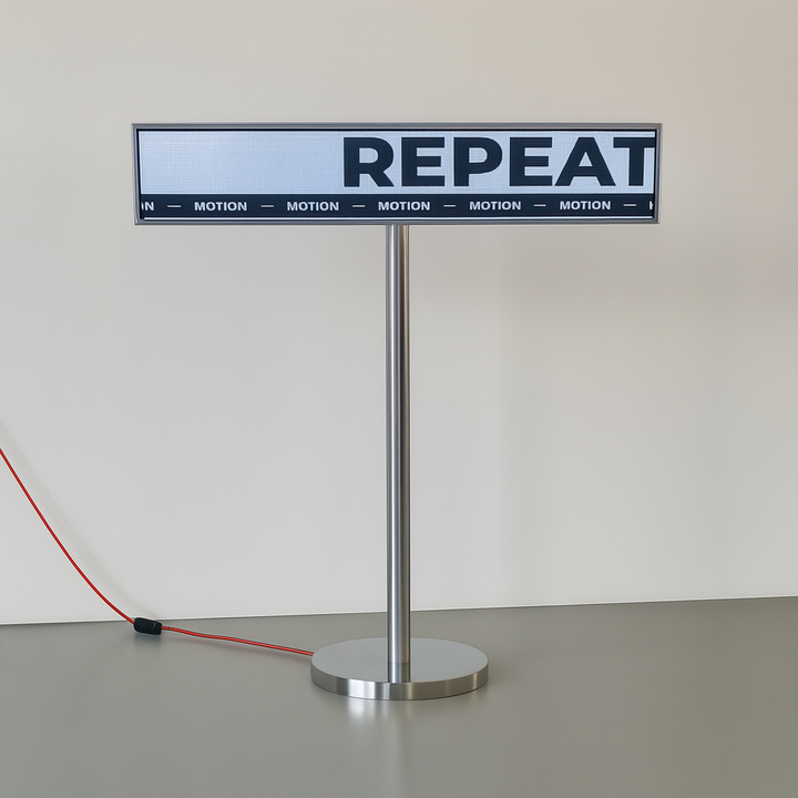 Floor standing LED direction display with slim P2 screen for indoor digital signage, ideal for retail wayfinding and commercial environments.