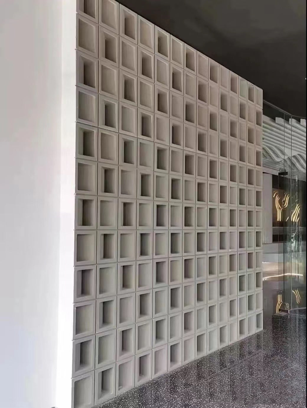 Modular foam ceramic components assembled into a decorative wall system