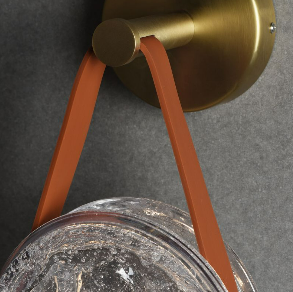 galaxy suspended wall lamp with amber leather strap showcasing crater textured glass for warm hallway accent lighting
