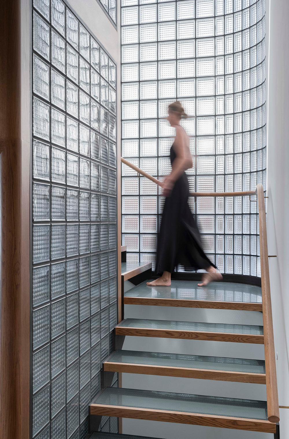 Glass block partition wall using Square Crystal Brick beside staircase
