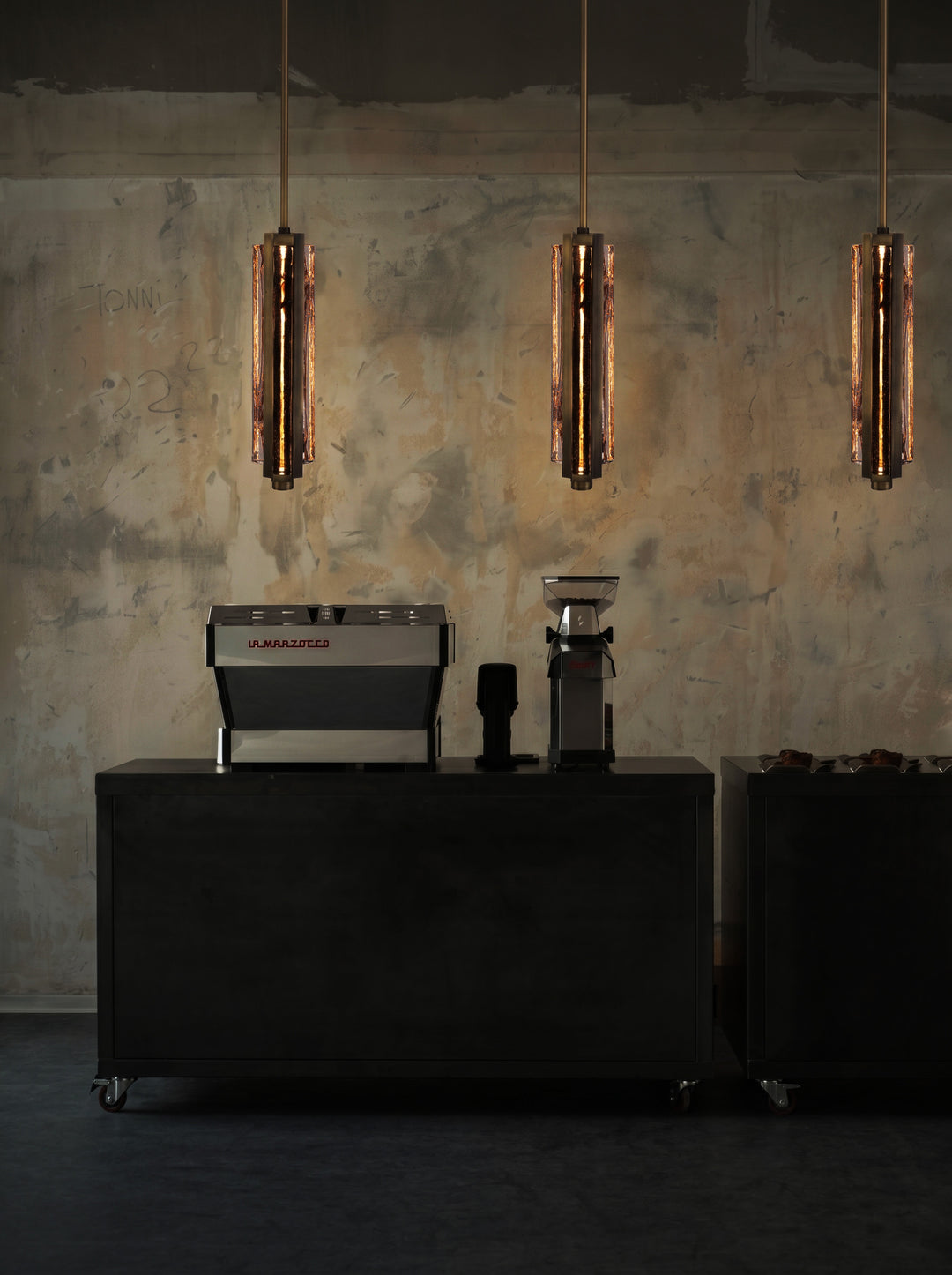 Cluster of hand-blown glass pendant lights, Running Water trio design for feature and ambient lighting