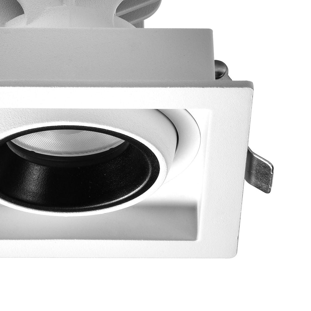Grid-style recessed LED downlight with adjustable optic for commercial interior lighting