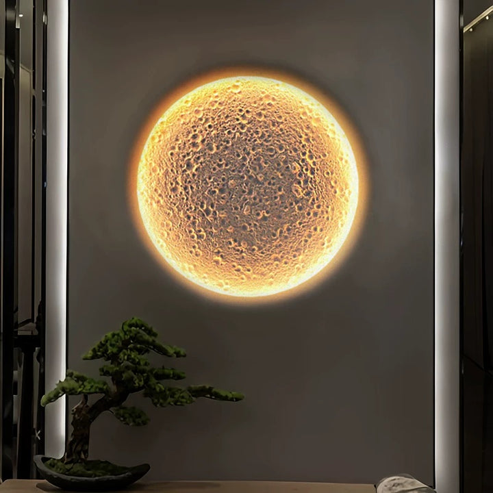 round gypsum LED wall light creating warm ambient interior lighting in a contemporary living room