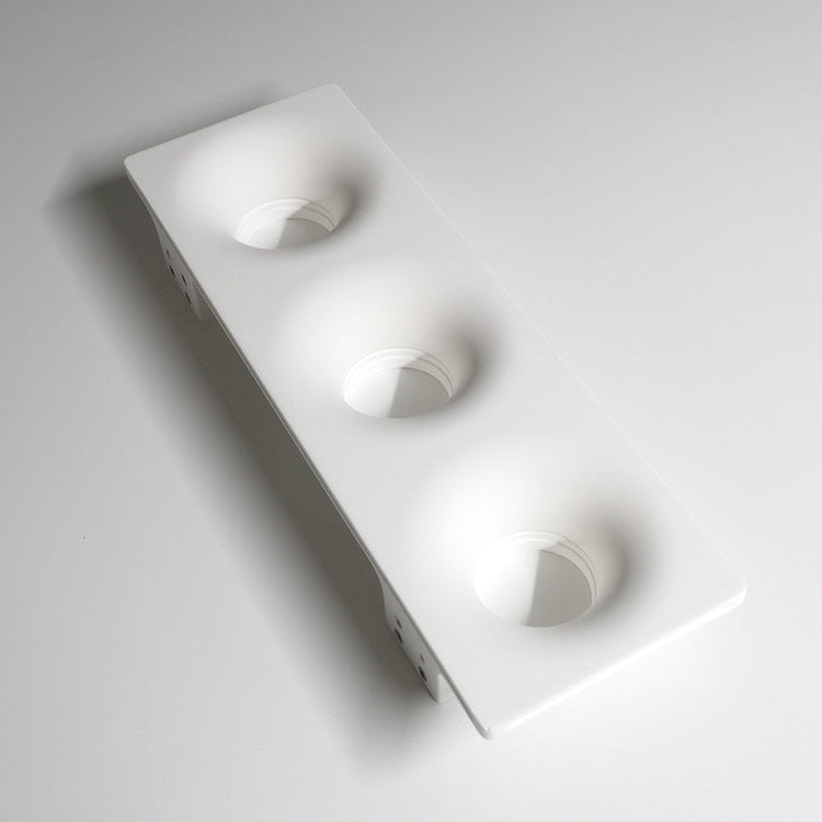 Gypsum triple trimless downlight housing with three recessed light apertures