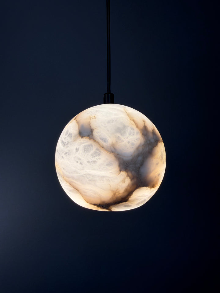 Half Moon Spanish alabaster pendant light crafted from natural stone with distinctive veining and warm translucent glow