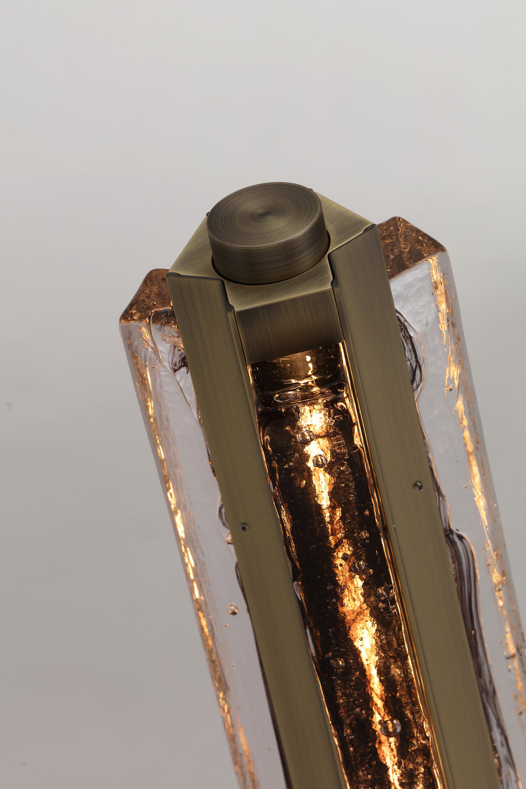 Close-up of hand-blown textured glass detail on designer table lamp Running Water Trio