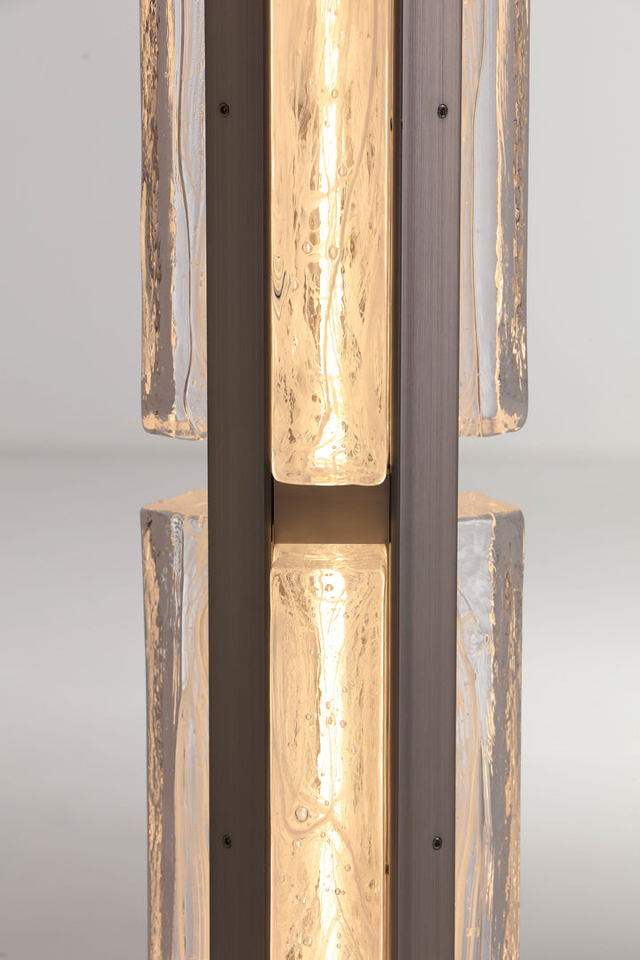 Close-up of hand-blown textured glass showing organic flowing pattern and light diffusion