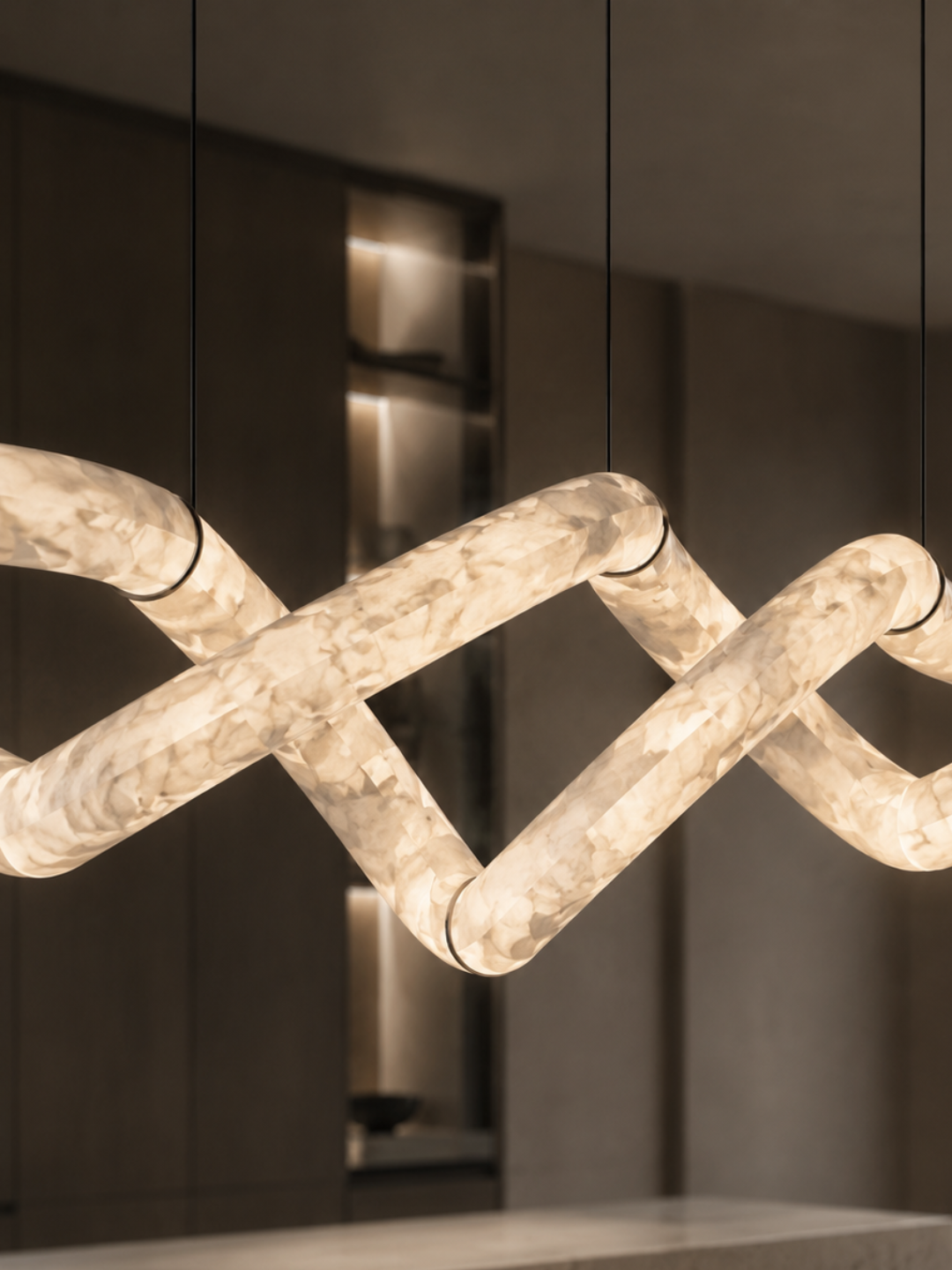 Close-up of the handcrafted Nexus Spanish Alabaster Linear Pendant Light showcasing genuine Spanish alabaster and sculptural design.