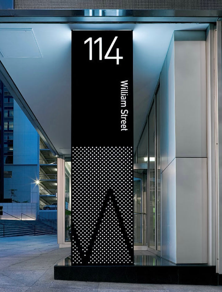 Indoor freestanding wayfinding sign displaying building or unit numbers for clear interior navigation