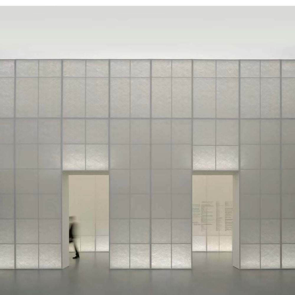 Integrated backlit lighting wall system for commercial and architectural interiors