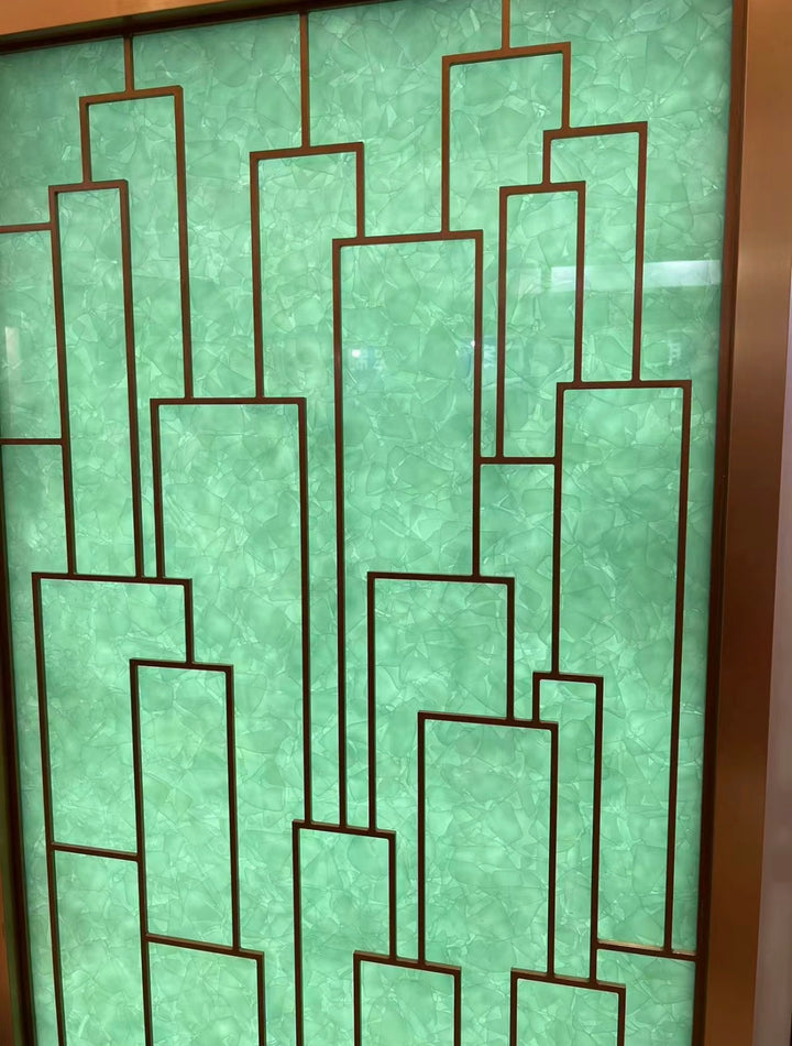 Jade glass panels forming a geometric feature wall for architectural interiors