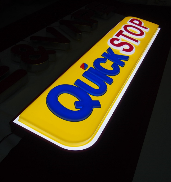 LED light box sign installed on shopfront signage, suitable for commercial and retail stores.
