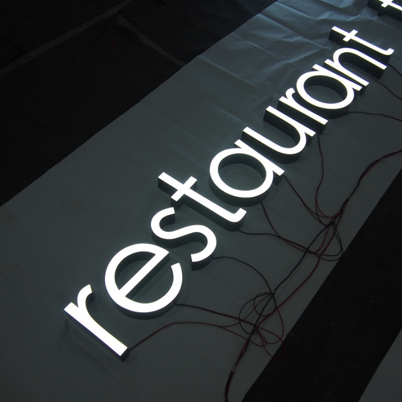 LED resin letter sign with clean illuminated face, used for restaurant interior branding and signage applications.