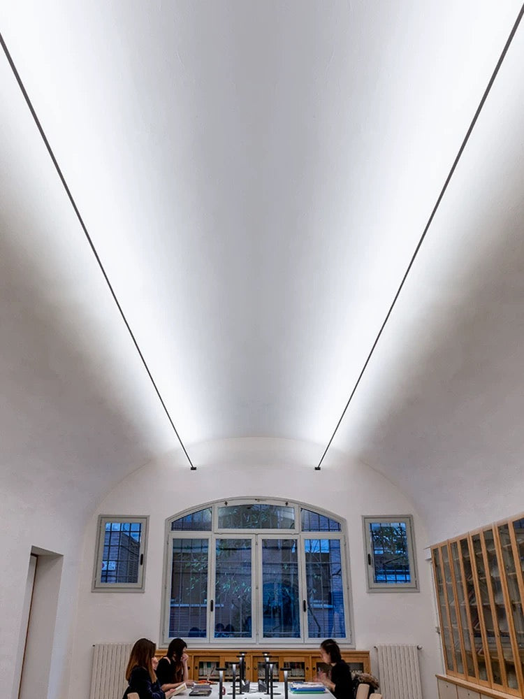 linear LED ceiling light highlighting an industrial modern space with clean architectural lighting