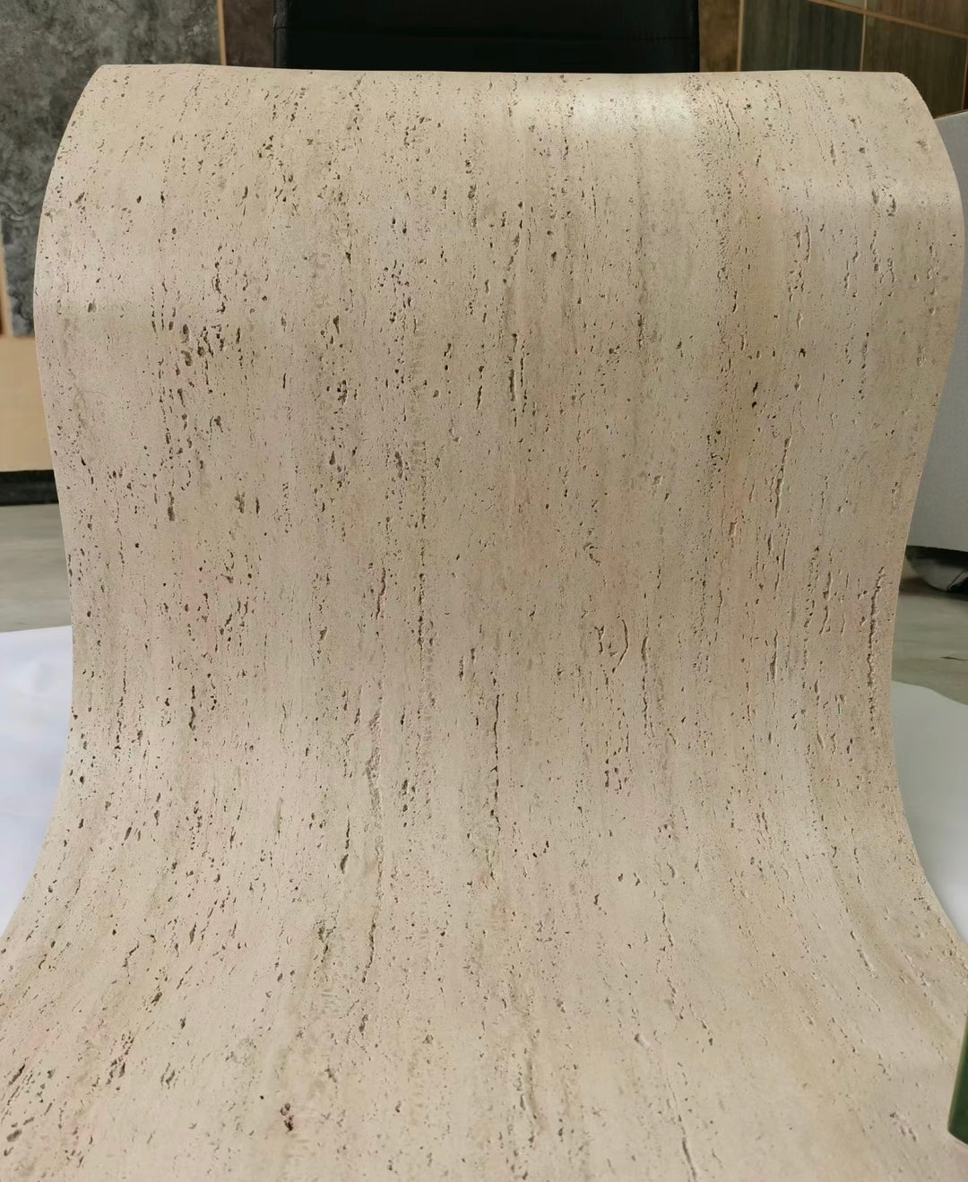 Linear Travertine stone textured wall panels used in architectural exterior space