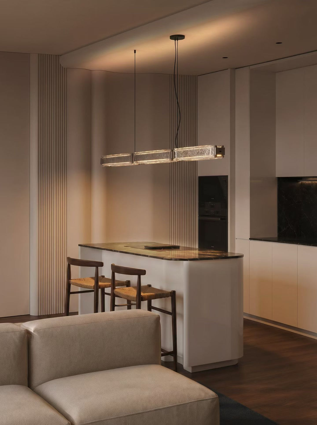Modern Scandinavian interior featuring the Lucretia Arctic Linear Square Pendant Light suspended above a kitchen and dining area with minimalist architectural LED lighting.