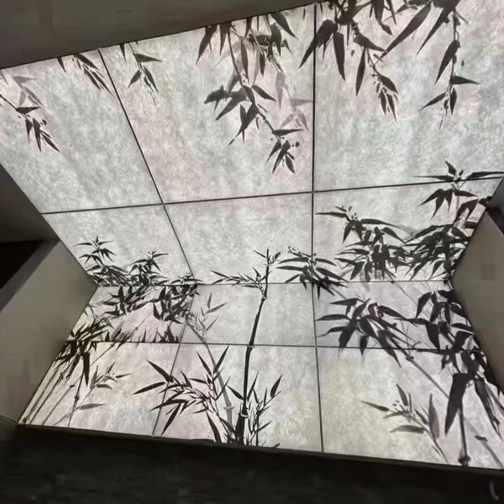 Lucretia backlit paper light box ceiling panel with decorative printed pattern providing ambient illumination.